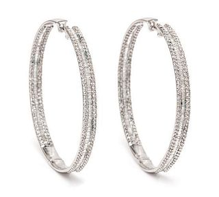 A Pair of 18 Karat White Gold and Diamond Hoop Earrings, 9.30 dwts.