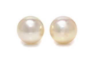 A Pair of White Gold and Cultured South Sea Pearl Stud Earrings, 3.80 dwts.