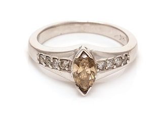 An 18 Karat White Gold, Colored Diamond and Diamond Ring, 4.10 dwts.