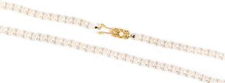 An 18 Karat Yellow Gold and Cultured Pearl Necklace, Mikimoto,