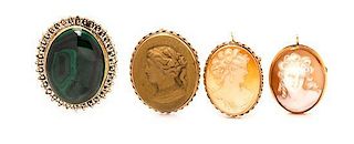 * A Collection of Yellow Gold and Hardstone Brooches, 36.20 dwts.