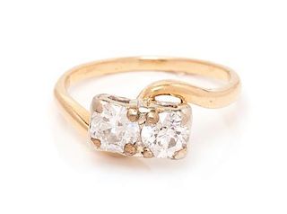 A Bicolor Gold and Diamond Toi et Moi Ring, 1.90 dwts.