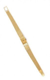 An 18 Karat Yellow Gold Wristwatch, Omega, 21.50 dwts.