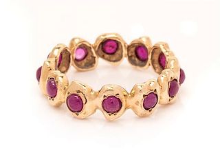 A 14 Karat Yellow Gold and Ruby Eternity Ring, 2.00 dwts.
