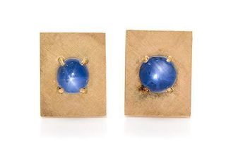 * A Pair of 14 Karat Yellow Gold and Star Sapphire Earclips, 8.35 dwts.