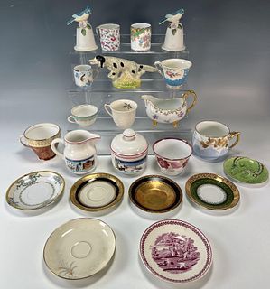 TEA CUPS AND SAUCERS WITH DECORATIVE ITEMS