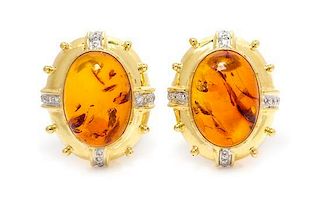 A Pair of 18 Karat Yellow Gold, Amber and Diamond Earclips, MAZ 9.40 dwts.