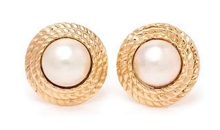 A Pair of 14 Karat Yellow Gold and Mabe Pearl Earclips, 7.40 dwts.