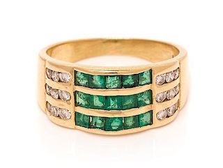 * A 14 Karat Yellow Gold, Emerald and Diamond Ring, 3.40 dwts.