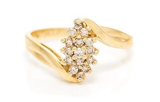 A 14 Karat Yellow Gold and Diamond Ring, 2.10 dwts.