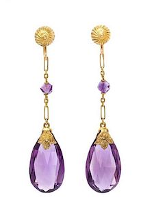 A Pair of Yellow Gold and Amethyst Drop Earclips, 5.70 dwts.