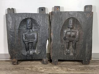 PAIR OF CARVED WOOD DOORS ATTRIBUTED TO SENUFO IVORY COAST.
