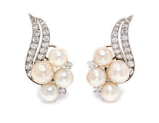 * A Pair of Platinum, Diamond and Cultured Pearl Earclips, Circa 1950, 14.60 dwts.