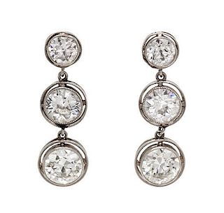 A Pair of Edwardian Platinum and Diamond Pendant Earrings, 3.50 dwts.