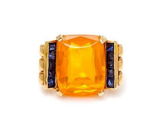 A Yellow Gold, Fire Opal, and Sapphire Ring, 10.50 dwts.