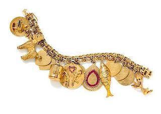 * A Yellow Gold Charm Bracelet with Fourteen Attached Charms, 80.35 dwts.
