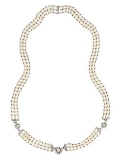 * A Platinum, Gold, Diamond and Seed Pearl Necklace, 20.90 dwts.