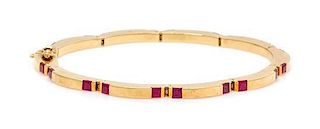 * An 18 Karat Yellow Gold and Ruby Bracelet, Tiffany and Co., 14.30 dwts.
