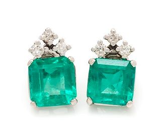 A Pair of White Gold, Emerald and Diamond Stud Earrings, 2.10 dwts.