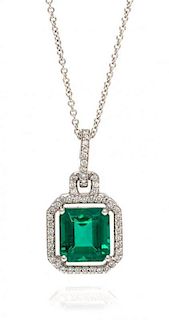 An 18 Karat White Gold, Emerald and Diamond Pendant, 6.10 dwts.