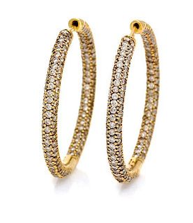 A Pair of 18 Karat Yellow Gold and Diamond Hoop Earrings, 5.40 dwts.