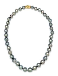 * A Collection of Graduated Single Strand Cultured Pearl Necklaces,