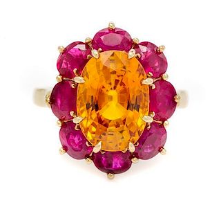 An 18 Karat Yellow Gold, Orange Sapphire and Ruby Ring, 6.70 dwts
