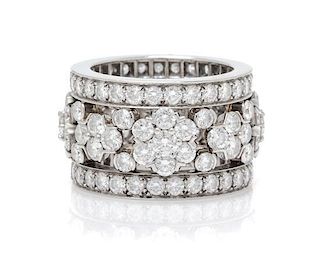 A Platinum and Diamond "Snowflake" Bandeau Ring, Van Cleef & Arpels, 13.40 dwts.