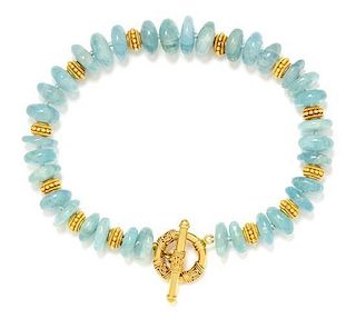 An 18 Karat Yellow Gold and Aquamarine Bead Necklace,
