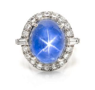 A Bicolor Gold, Star Sapphire and Diamond Ring, 12.20 dwts.