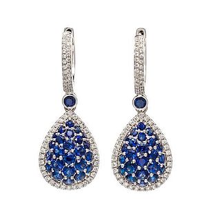 A Pair of 18 Karat White Gold, Sapphire and Diamond Pendant Earrings, Gregg Ruth, 8.90 dwts.