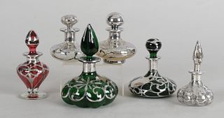 A Group of Silver Overlay Glass Scent Bottles