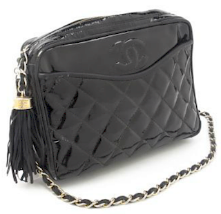 * A Chanel Black Quilted Patent Leather Bag, 9 x 6 x 2 inches.
