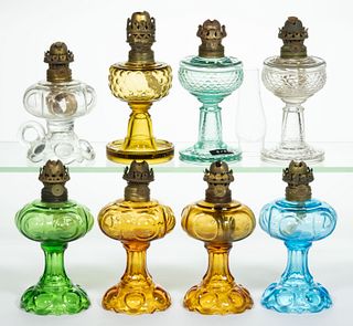 ASSORTED PATTERN MINIATURE STAND AND FOOTED FINGER LAMPS, LOT OF EIGHT