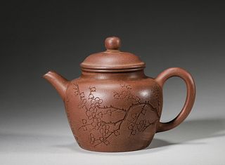 A plum blossom patterned zisha clay teapot ,Qing Dynasty,China