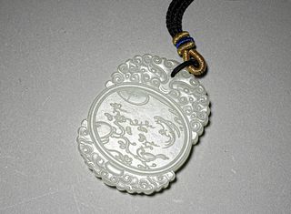 A bird and flower patterned jade pendant,Qing Dynasty,China