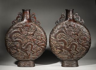 A pair of cloud and dragon patterned aloeswood moon flasks,Qing Dynasty,China