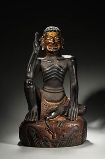 A Tibetan stone buddha statue