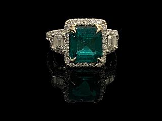 GIA Certified Green Emerald Ring with two trapezoidal diamonds