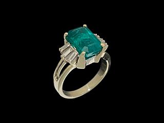 GIA Certified 3.55 CT Green Emerald Ring with Six Baguette diamond accents.