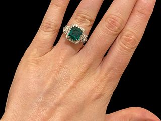 18kt WG Stunning 3.47 CT GIA Certified Green Emerald Ring with Over 2ct VS-E diamonds.
