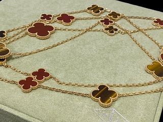 Van Cleef & Arpels, 18K Yellow Gold, Carnelian, Tiger Eye, Magic Alhambra, 16 Motifs Necklace
