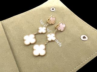 Van Cleef & Arpels Magic Alhambra earrings, 3 Motifs, 18k yellow gold, Mother-of-pearl