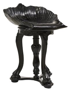 ITALIAN GROTTO STYLE CARVED & BLACK PAINTED SHELL-FORM PIANO STOOL