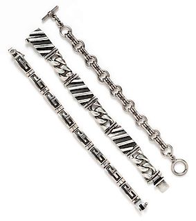 A Collection of Sterling Silver Bracelets, 164.90 dwts.