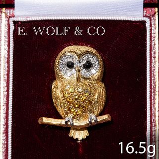 E WOLF & CO, LONDON. FINE YELLOW AND WHITE DIAMOND OWL BROOCH