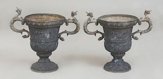 PAIR OF CAST LEAD TWIN SERPENT HANDLED URNS