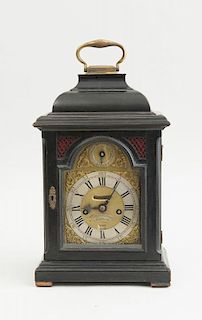 GEORGE II SILVERED STEEL AND BRASS CLOCK FACE AND MOVEMENT IN AN ASSOCIATED EBONIZED WOOD BRACKET CASE