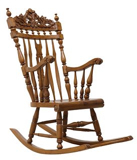 CARVED WINDSOR STYLE ROCKING CHAIR