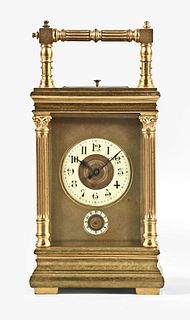 French quarter striking carriage clock with alarm in brass case